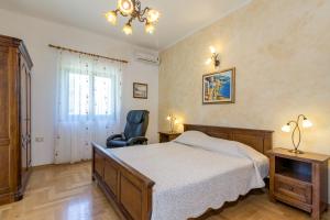Ένα ή περισσότερα κρεβάτια σε δωμάτιο στο Holiday Home Sarita +61 φωτογραφίες