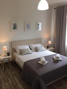 Postel nebo postele na pokoji v ubytování BDM apartment