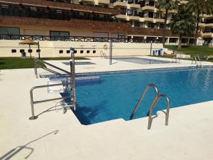 Bazén v ubytovaní Aloha Playa Primera alebo v jeho blízkosti