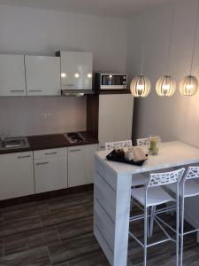 Kuchyň nebo kuchyňský kout v ubytování BDM apartment