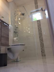 Koupelna v ubytování BDM apartment + 33 fotografií