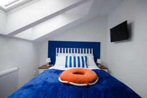 Postel nebo postele na pokoji v ubytování Pokoje Gościnne Hafen Guesthouse - Władysławowo