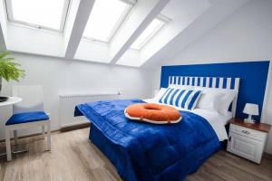 Postel nebo postele na pokoji v ubytování Pokoje Gościnne Hafen Guesthouse - Władysławowo