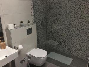 Koupelna v ubytování Studio apartman Dado + 11 fotografií