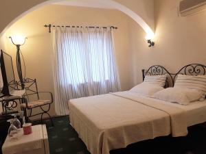 Postel nebo postele na pokoji v ubytování A&B Home Hotel