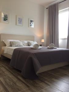 Postel nebo postele na pokoji v ubytování BDM apartment