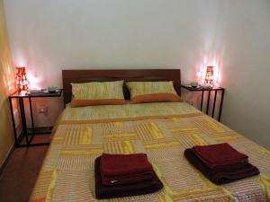 A bed or beds in a room at Etna Hiking B&B