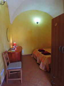 A bed or beds in a room at Etna Hiking B&B