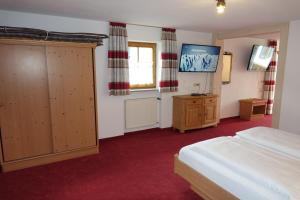 Φωτογραφία από το άλμπουμ του Gästehaus Guggomos "Hopfen am See" σε Füssen