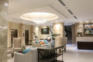 a living room with a couch and a table at The Executive Hotel in Panama City