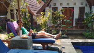 Posezení v ubytování Balengku Homestay
