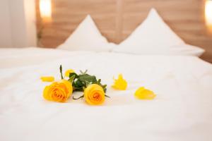 Postel nebo postele na pokoji v ubytování Hotel Schützenburg