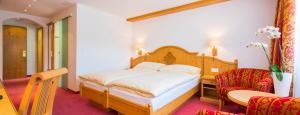 Voodi või voodid majutusasutuse Hotel Excelsior toas