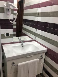 Koupelna v ubytování Hotel Malpensafiera