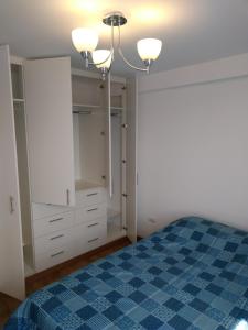 Katil atau katil-katil dalam bilik di Apartamentos Beaterio Yanahuara