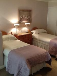 A bed or beds in a room at The Devonian 