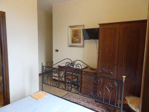 Postel nebo postele na pokoji v ubytování Castello di Altomonte