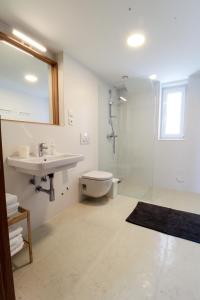 Ένα μπάνιο στο Drance 16 Apartments +39 φωτογραφίες