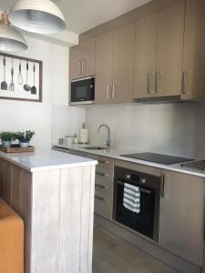 Kuchyňa alebo kuchynka v ubytovaní Apartament Neret II
