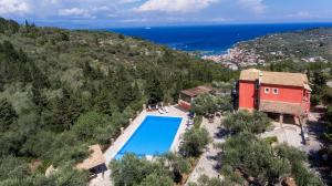 an aerial view of a house with a swimming pool at Bella Vista Villas & Suites in Gaios