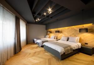 Cama o camas de una habitación en Hotel London B&B