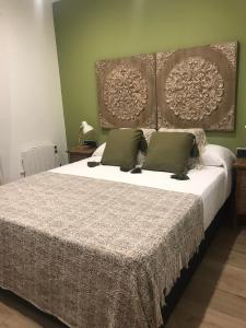 Posteľ alebo postele v izbe v ubytovaní Apartament Neret II
