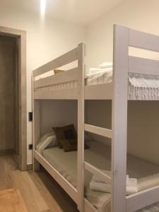 Posteľ alebo postele v izbe v ubytovaní Apartament Neret II