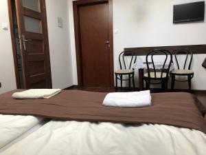 Posteľ alebo postele v izbe v ubytovaní Apartamenty i Pokoje Na Letniej