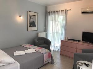 Posteľ alebo postele v izbe v ubytovaní Aris sweet home