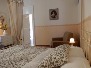 Postel nebo postele na pokoji v ubytování Luciano And Son