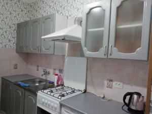 A kitchen or kitchenette at Nikos Guest House