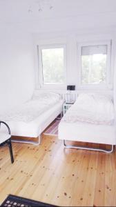 Кровать или кровати в номере Flugumýri 2