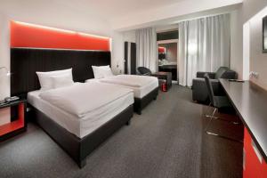 Letto o letti in una camera di Sport & Relax Hotel Davidek