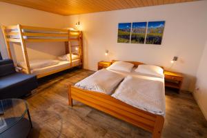 Postel nebo postele na pokoji v ubytování Hotel Restaurant Simplon