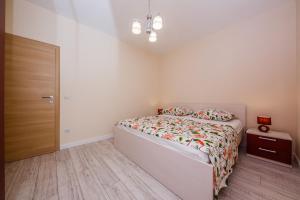 Voodi või voodid majutusasutuse Apartman Markulin toas