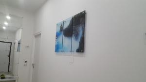 a picture hanging on a wall in a room at RESIDENZA BURMARIA Free Parking in Tropea +101 photos