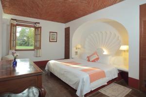 Posada del Tepozteco - Hotel & Gallery客房内的一张或多张床位