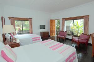 Posada del Tepozteco - Hotel & Gallery客房内的一张或多张床位