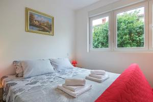 Postel nebo postele na pokoji v ubytování Apartment Danijela I