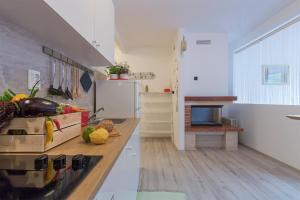 Kuchyň nebo kuchyňský kout v ubytování Apartment Danijela I