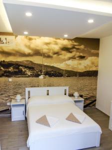 Ένα ή περισσότερα κρεβάτια σε δωμάτιο στο Villa Nobilo
