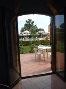 Патио или другая зона на открытом воздухе в Hotel Ristorante Al Canto delle Sirene