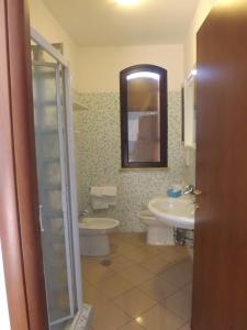 Ванная комната в Hotel Ristorante Al Canto delle Sirene