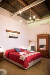 Voodi või voodid majutusasutuse Guest Art Napoli toas