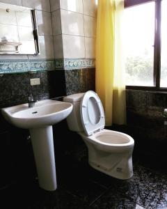 Koupelna v ubytování Pu Shi Homestay