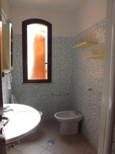 Ванная комната в Hotel Ristorante Al Canto delle Sirene