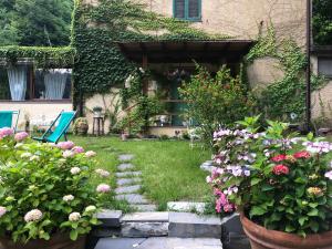 Vonkajšia záhrada v ubytovaní La casa del cuore