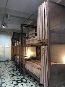 Postel nebo postele na pokoji v ubytování Chato Hostel