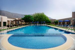Bazén v ubytování Golden Tulip Nizwa Hotel nebo v jeho okolí