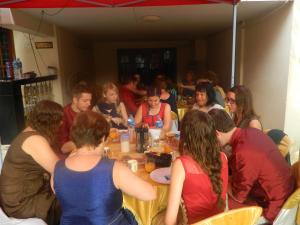 a group of people sitting around a table at Prems Homestay in Cochin